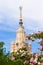 The spire of the Moscow state University named after Lomonosov and flowering Apple trees. Beautiful Moscow. Russia