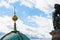 Spire and sculpture on roof of Berlin Cathedral