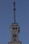 Spire with  tower clock and star decoration of the North River Terminal Rechnoy Vokzal renovated Stalinist empire building