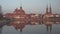 Spires of Cathedral of St John Baptist reflected in water in Wroclaw