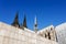 Spires of the Cologne Cathedral behind a museum in Cologne, Germany