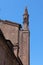 Spires of Piacenza Cathedral against the blue sky, Italy