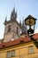 Spires, rooftops and an old street light in Prague, Czech Republic