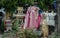 A spirit house or Joss house built for guardian spirit to reside with Traditional thai costumes and Red soft drink is the belief