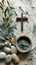 Spiritual Ash Wednesday Concept with Cross Burnt Palm Leaves Olive Branches and Stones on Textured Surface