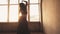 Spiritual dance passionate woman sun lights window