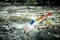 Spiritual man swims by tibetan flags