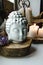 Spiritual ritual meditation face of Buddha ametist candles on old wooden background