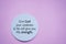 Spiritual text message on a circle paper - Give God your weakness and He will give you His Strength. Christianity quote on pink.