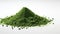 Spirulina or chlorella green powder on a white background. Dried seaweed. Healthy superfood. Matcha Powder. Close up