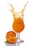 Splash in glass of orange alcoholic tropical cocktail drink