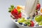 Splash of milk pushes fresh fruit from the bowl