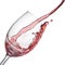 Splash of rose wine in wineglass on white
