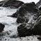 Splash of waves about coastal stones