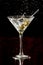 Splashing martini olives