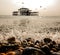 Splashing ocean and abandoned pier