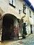 Splendid ancient door and wall in Saluzzo town, Piedmont region, Italy. History, enchanting architecture and art