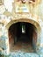 Splendid ancient door and wall in Saluzzo town, Piedmont region, Italy. History, enchanting architecture and art