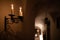 Splendid chandelier with lit candles in a beautiful room