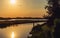 Splendid countryside landscape by the water before sunset