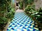 Splendid garden, enchanting yard, plants, vases, stair and flowers in Erice town, Sicily, Italy