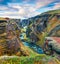 Splendid morning view of Fjadrargljufur canyon and river. Colorful summer scene of South east Iceland, Europe. Beauty of nature