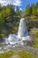 Splendid summer view with popular waterfall Steinsdalsfossen