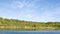 splendid view of a calm lake and autumn forest on a sunny day. location place of Luban, Belarus, Europe. beauty of earth