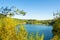 splendid view of a calm lake and autumn forest on a sunny day. location place of Luban, Belarus, Europe. beauty of earth