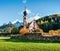 Splendid view of Chiesetta di San Giovanni in Ranui church in front of the Geisler, Santa Magdalena village location. Colorful