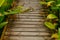 Spliced wooden planks are laid on the ground as architectural decorations in tourist attractions