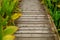 Spliced wooden planks are laid on the ground as architectural decorations in tourist attractions