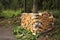 Split birch firewood stacked