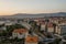 Split, Croatia - Aug 13, 2020: Aerial drone shot of railway near ferry port in sunset hour