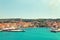 SPLIT, CROATIA - JULY 12, 2017: Panoramic view on harbor of Supetar city from the side of sea - Croatia