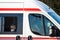 Split Croatia September 2020 White ambulance van seen from the side as it passes by. Three paramedics in the front wearing