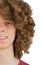 Split in half cropped portrait of a young curly European man with long curly hair and a dreamy smile close-up. very lush male hair