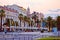 Split main waterfront walkway palms and architecture