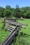 Split Rail Fence Zigzags across a Green Field