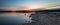 Split-screen sunrise as sky meets water at Blue Marsh Lake in Berks County, PA