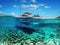 Split view - half underwater view of beautiful seabed with sea fishes and beautiful marine yacht, Turkey, Bodrum
