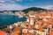 Split waterfront and Marjan hill aerial view, Dalmatia, Croatia. Panoramic summer cityscape of old medieval city Split, Croatia,