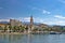 Split waterfront palm promenade view