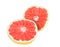 Splitting half, ripe, organic grapefruit isolated.