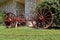 Spokes of an old wood wagon wheekl show deterioration