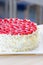 Sponge cake with strawberries, almonds and cream