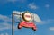 Sponsors welcome sign. Street signs with text `sponsors welcome` on metal pole. Directional road. Blue sky background. Charity.