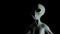 Spooky alien`s face on black background. 3D rendered illustration