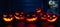 Spooky halloween background. scary pumpkin with burning eyes and