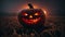 Spooky Halloween jack-o-lantern in misty field at night